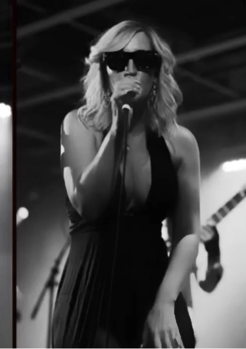 Sailor Jane performing live in black and white