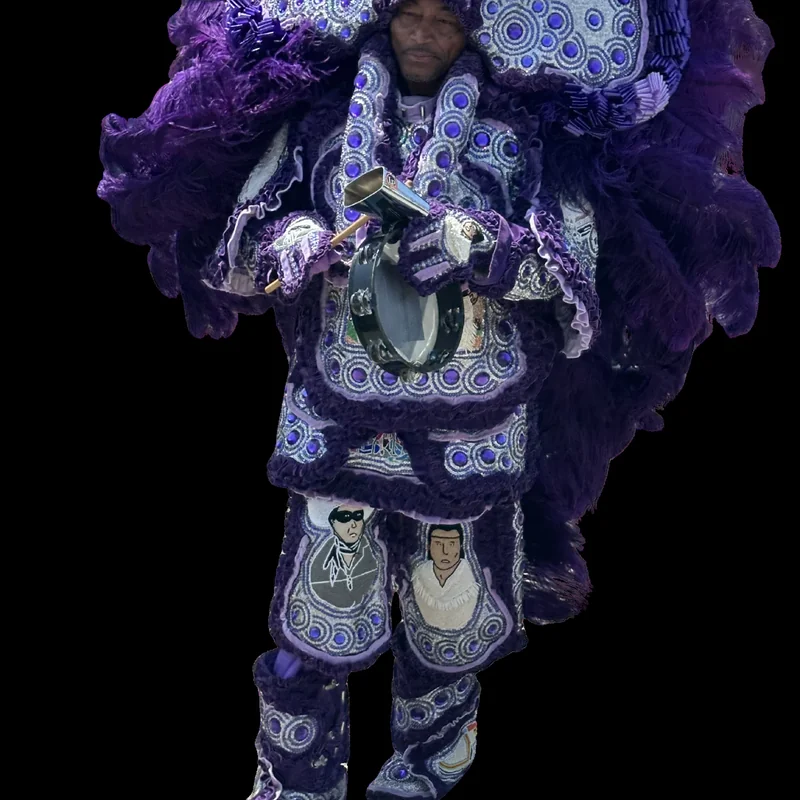 New Orleans Jazz Edition — a Mardi Gras Indian in full feathered regalia