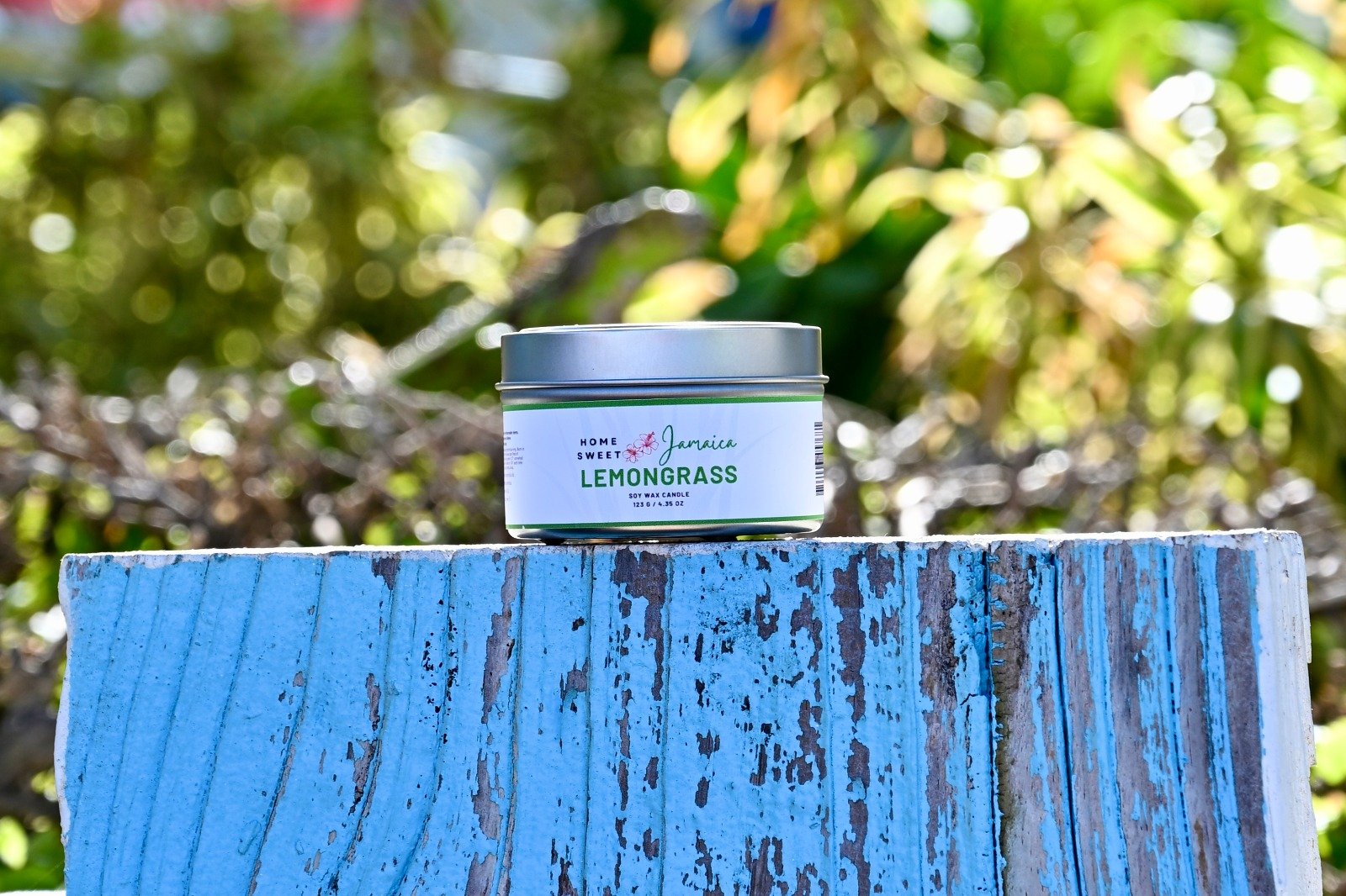 Lemongrass candle on fence